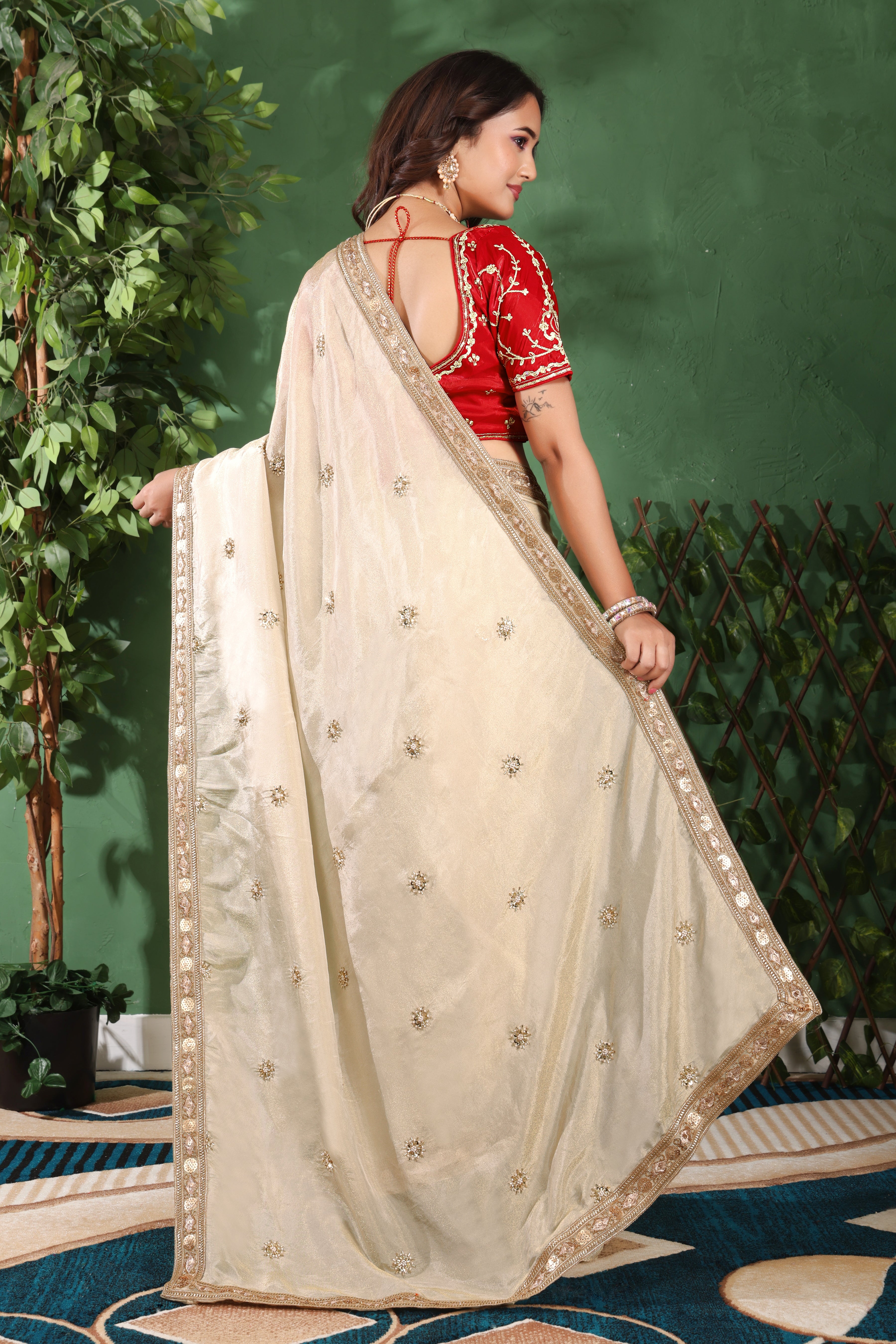 Ivory Blossom Saree with stiched blouse.